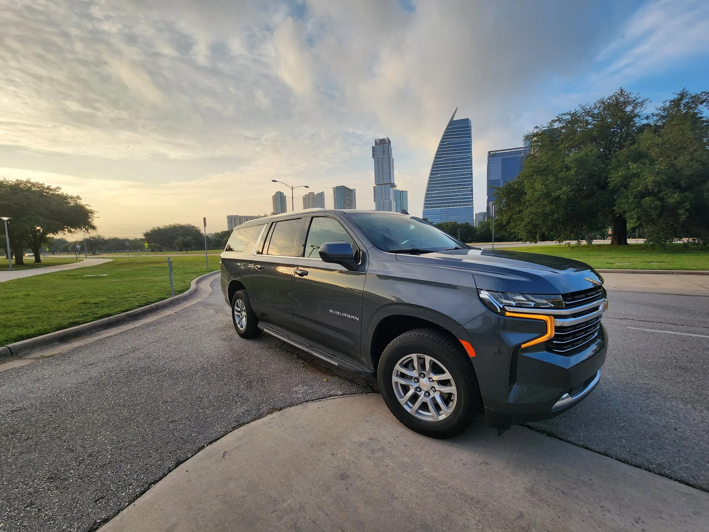 Lake Travis Limo Chevrolet Suburban with the downtown Austin skyline